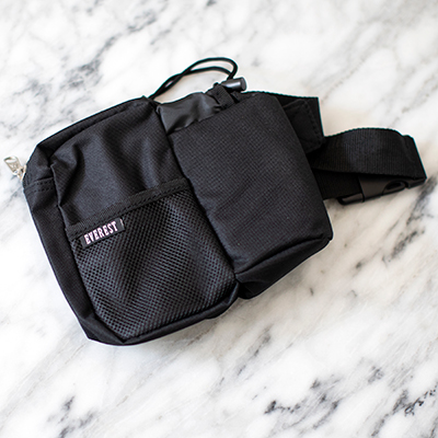 EVEREST<sup>&reg;</sup> Waist Bottle Pack—Features a Zippered Pouch with an Insulated Bottle Holder. For wear around the waist with snap-enclosure and measures 7" x 7.5" x 3" 